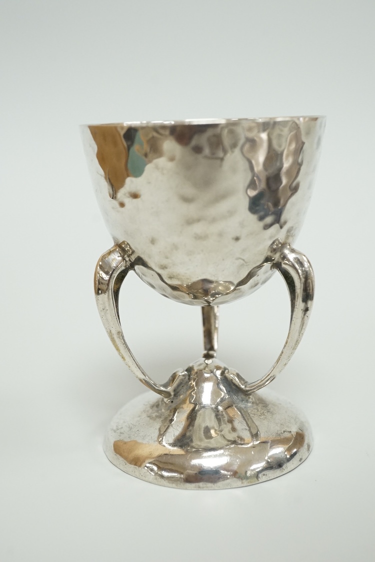 A late 19th century French small white metal Holy Water stoop, 11.4cm, together with a Victorian silver and leather mounted glass hip flask(a.f.), a late Victorian silver 'grenade' lighter by Sampson Mordan & Co, two sil
